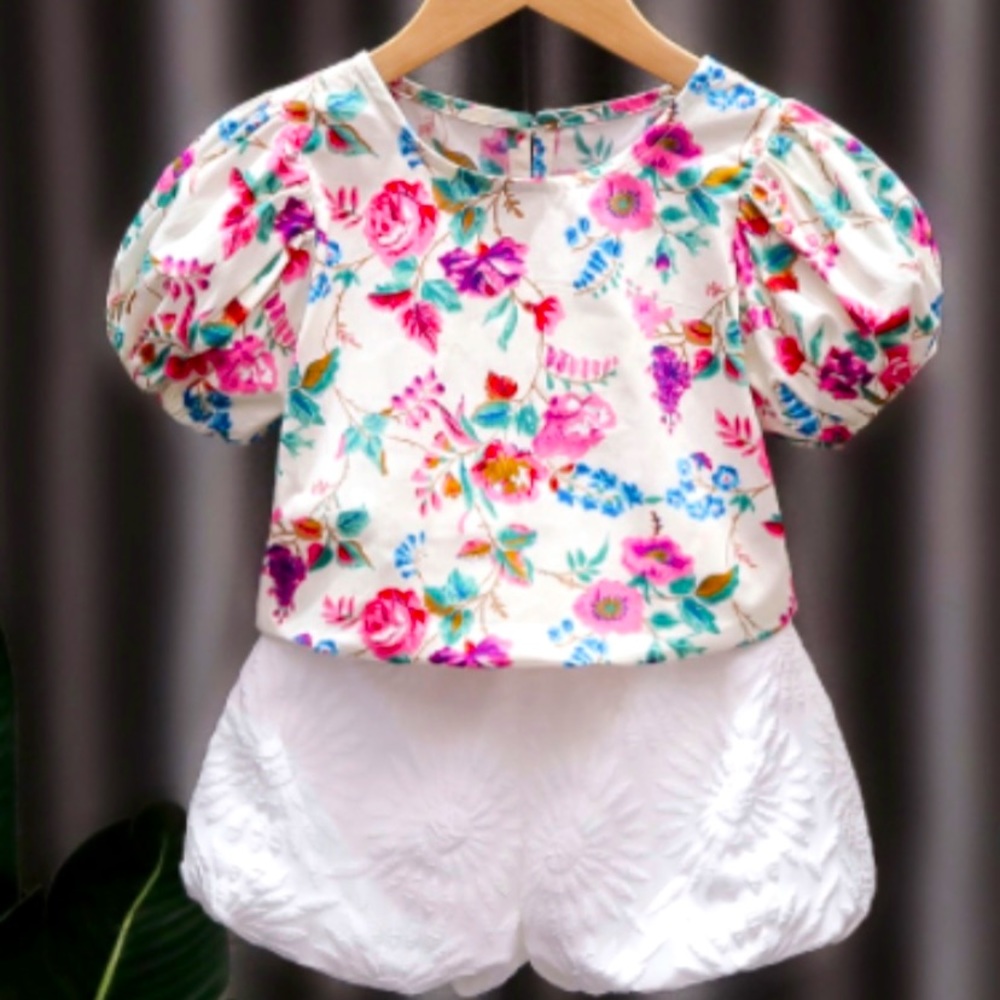 Girls floral set. Included top and shorts. All new